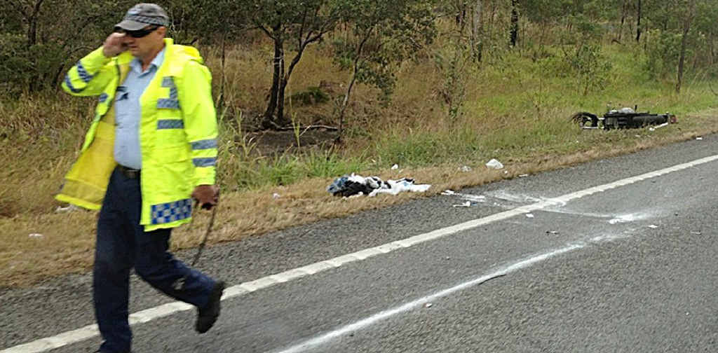 Police investigate the crash in which a motorcyclist died after a collision with a truck 10km south of Carmila yesterday morning. Police investigate the crash in which a motorcyclist died after a collision with a truck 10km south of Carmila yesterday morning.